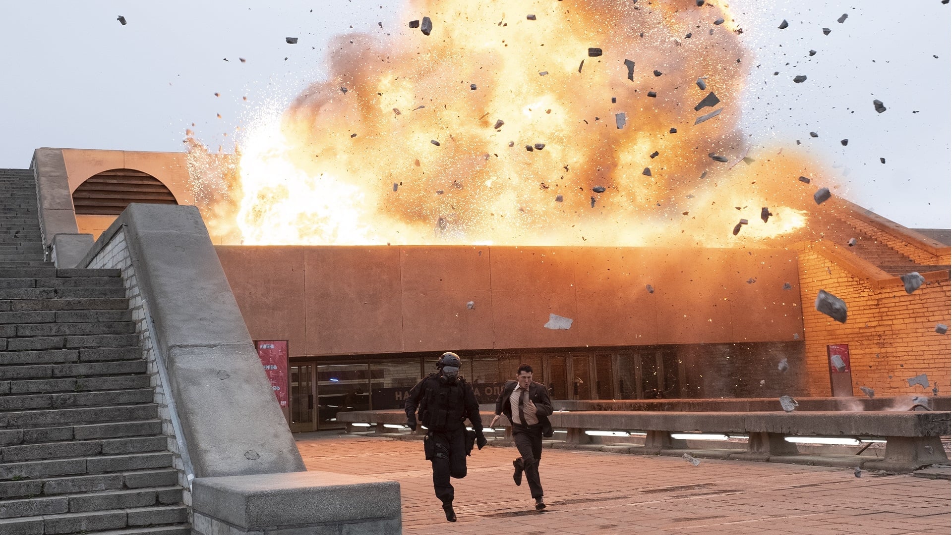 Tenet explosion action from Christopher Nolan reviewed by Christian Movie Podcast Cinematic Doctrine CINDOC