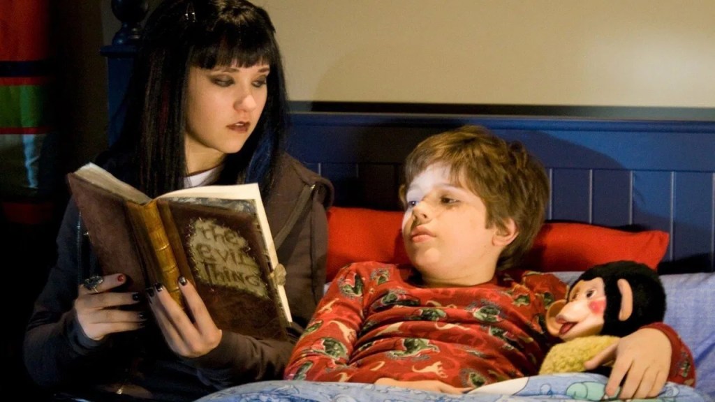 Emily Osment reading in the haunting hour