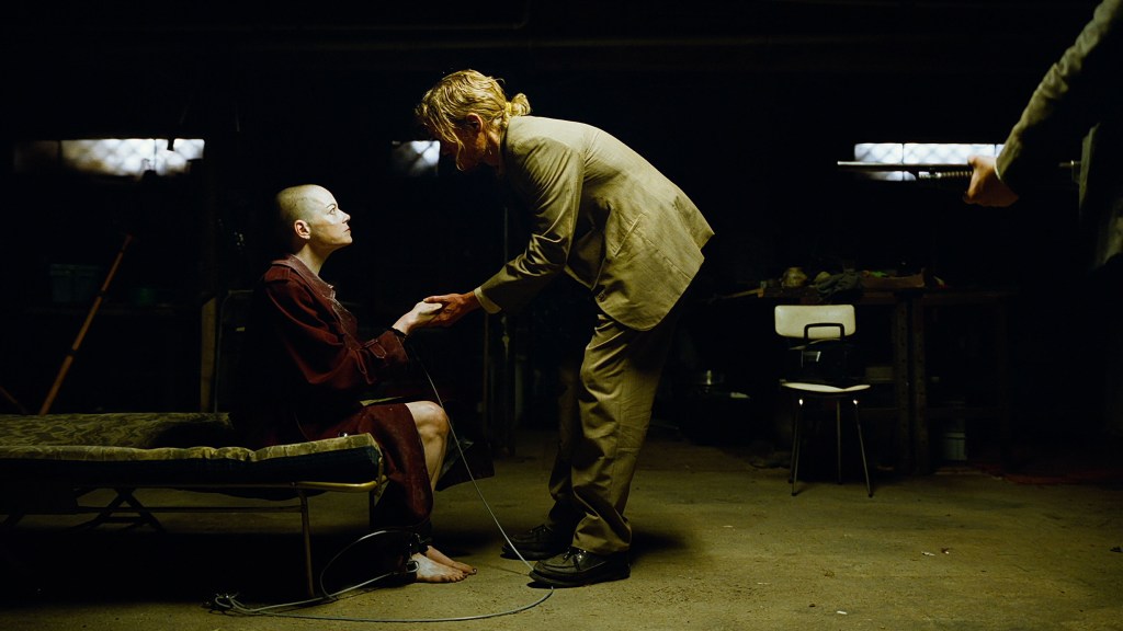 jesse plemons and emma stone in bugonia