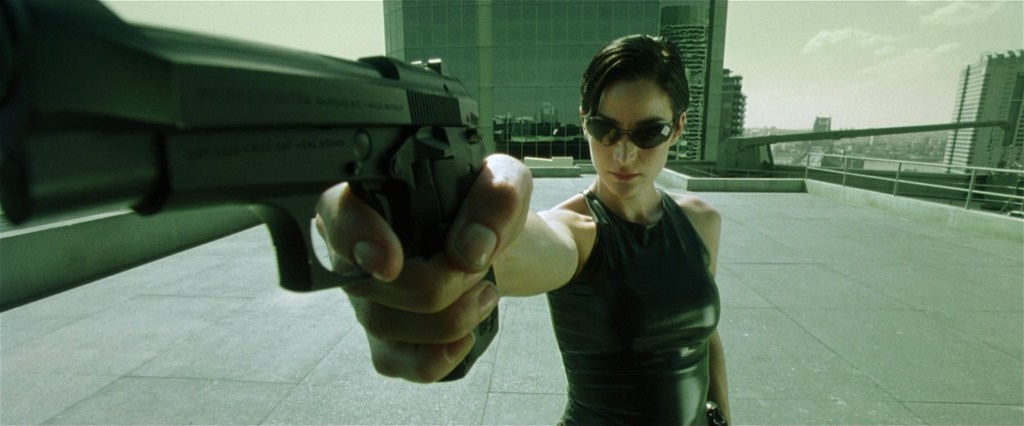 trinity pointing weapon in the matrix